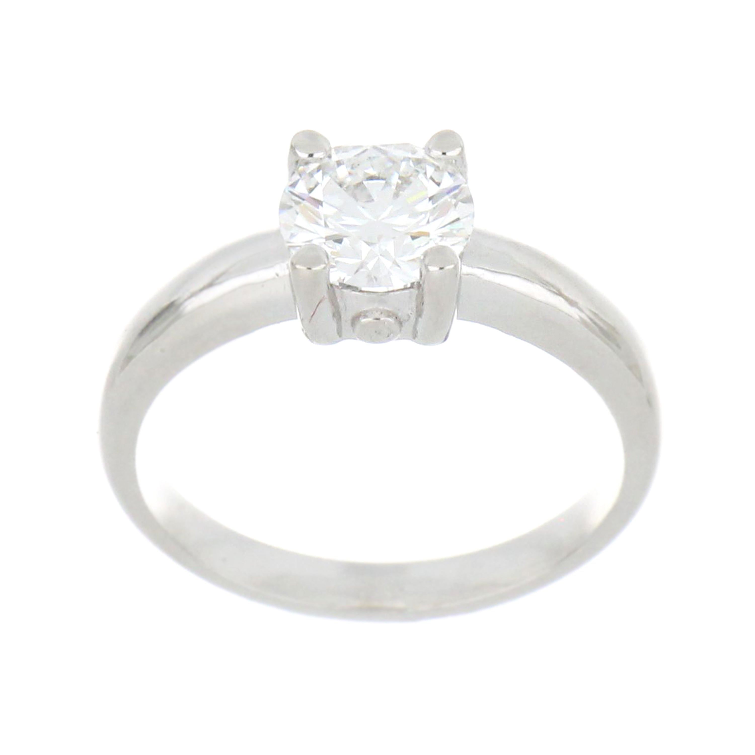 14kt white gold solitaire ring with a round brilliant cut lab grown diamond set in four claws, angled side view showing polished domed shank