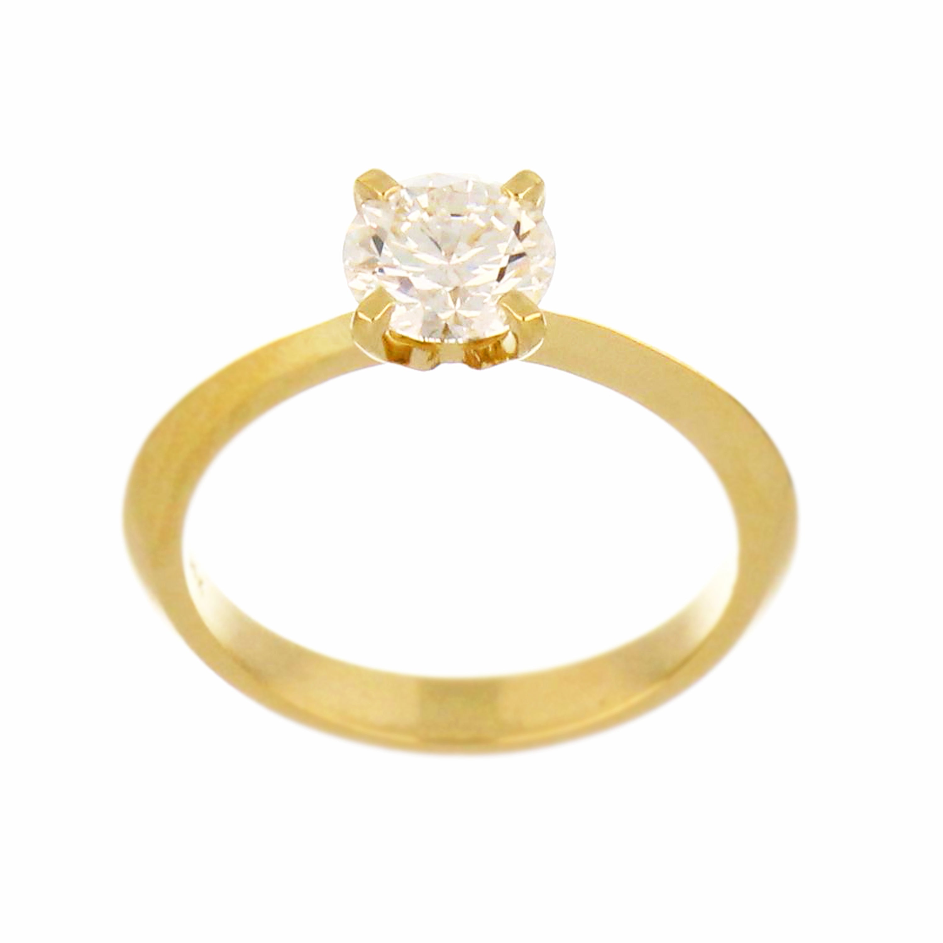 14kt yellow gold solitaire ring with round brilliant cut lab grown diamond viewed from the front, highlighting the 4-claw setting and diamond clarity