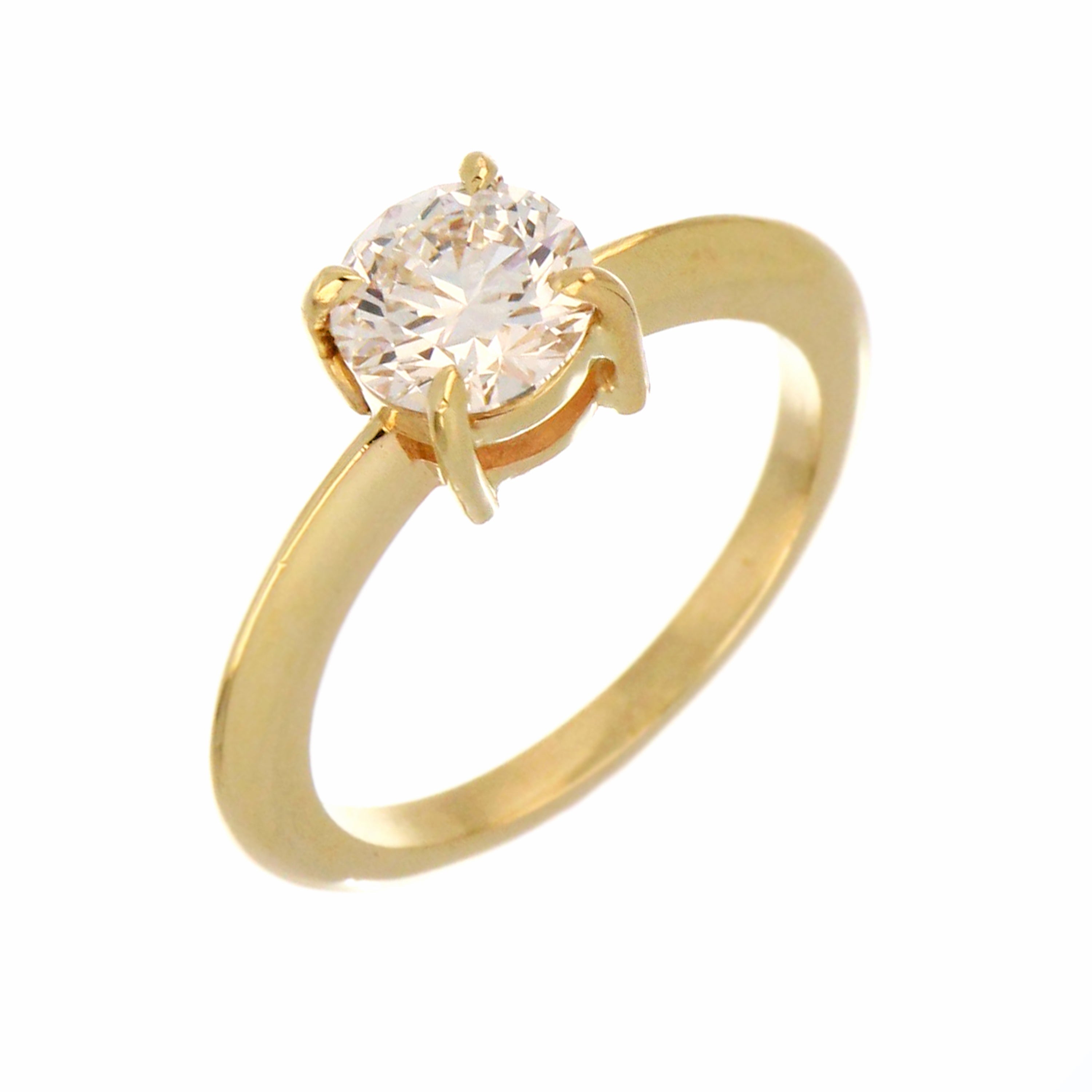 Detailed side view of 14kt yellow gold ring featuring 1.05ct round lab grown diamond in 4 claw setting