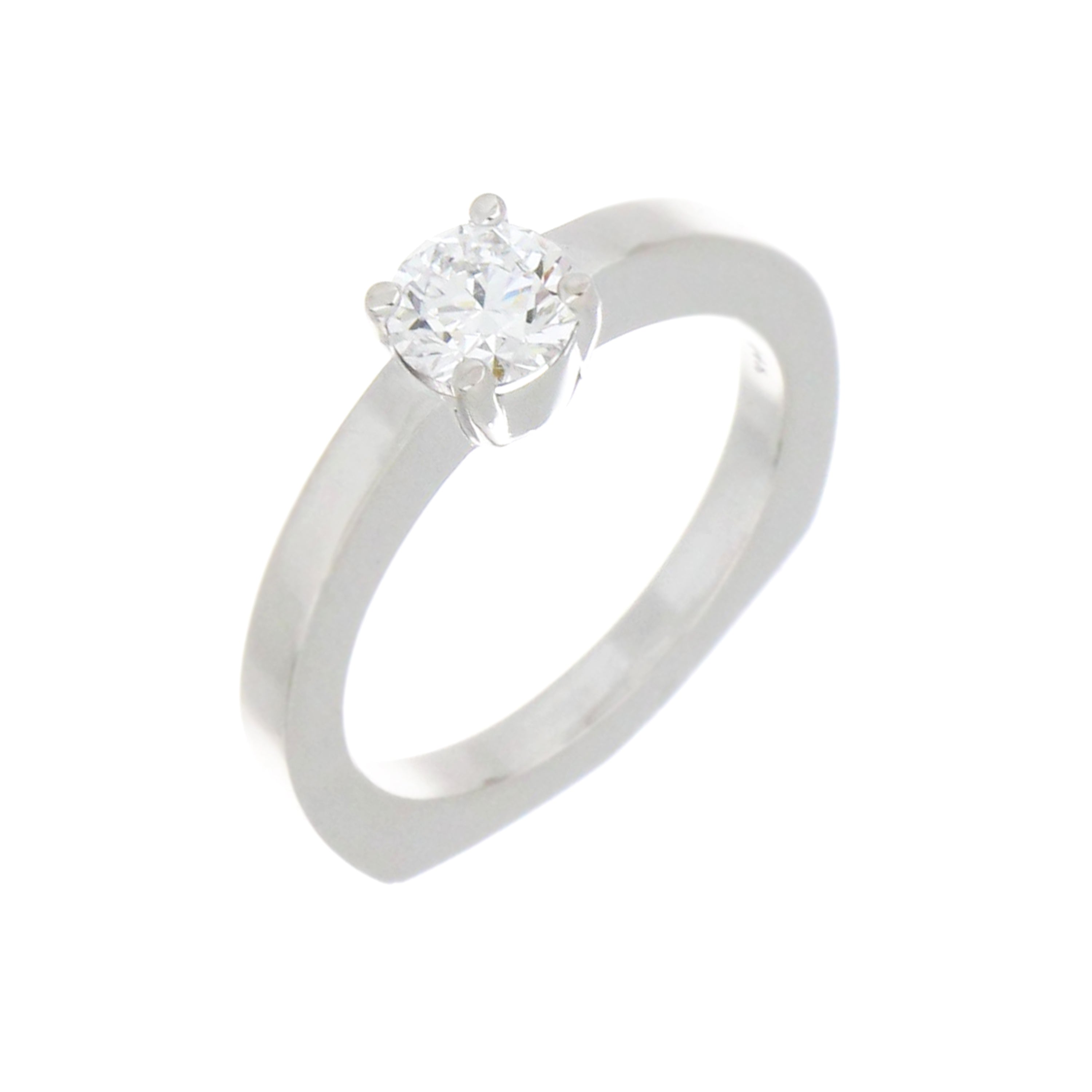 Close-up view of round lab grown diamond solitaire with claw setting on 14kt white gold band, highlighting diamond clarity and reflections