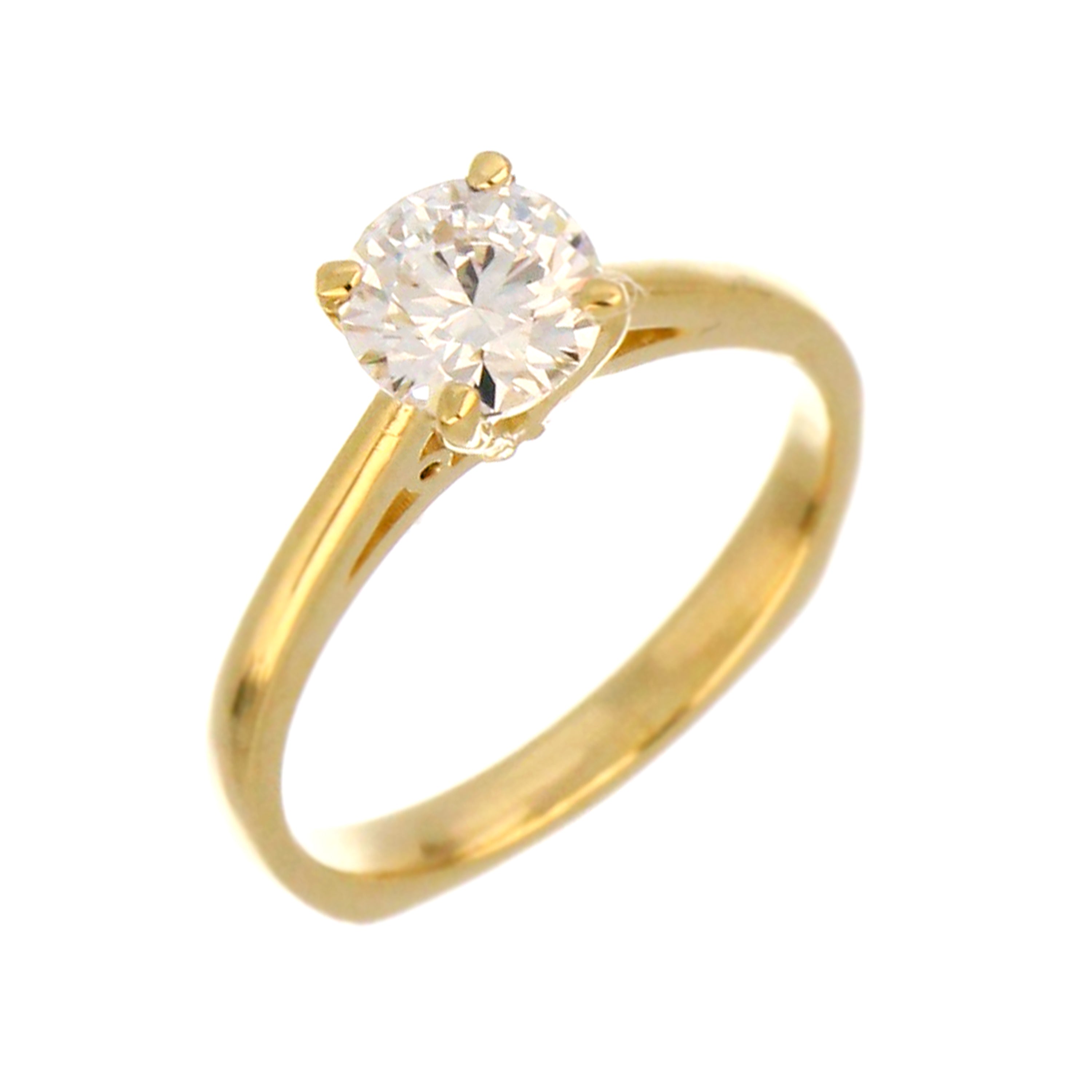 Side angle of 14kt yellow gold solitaire diamond ring showing polished shank and secure 4-claw setting