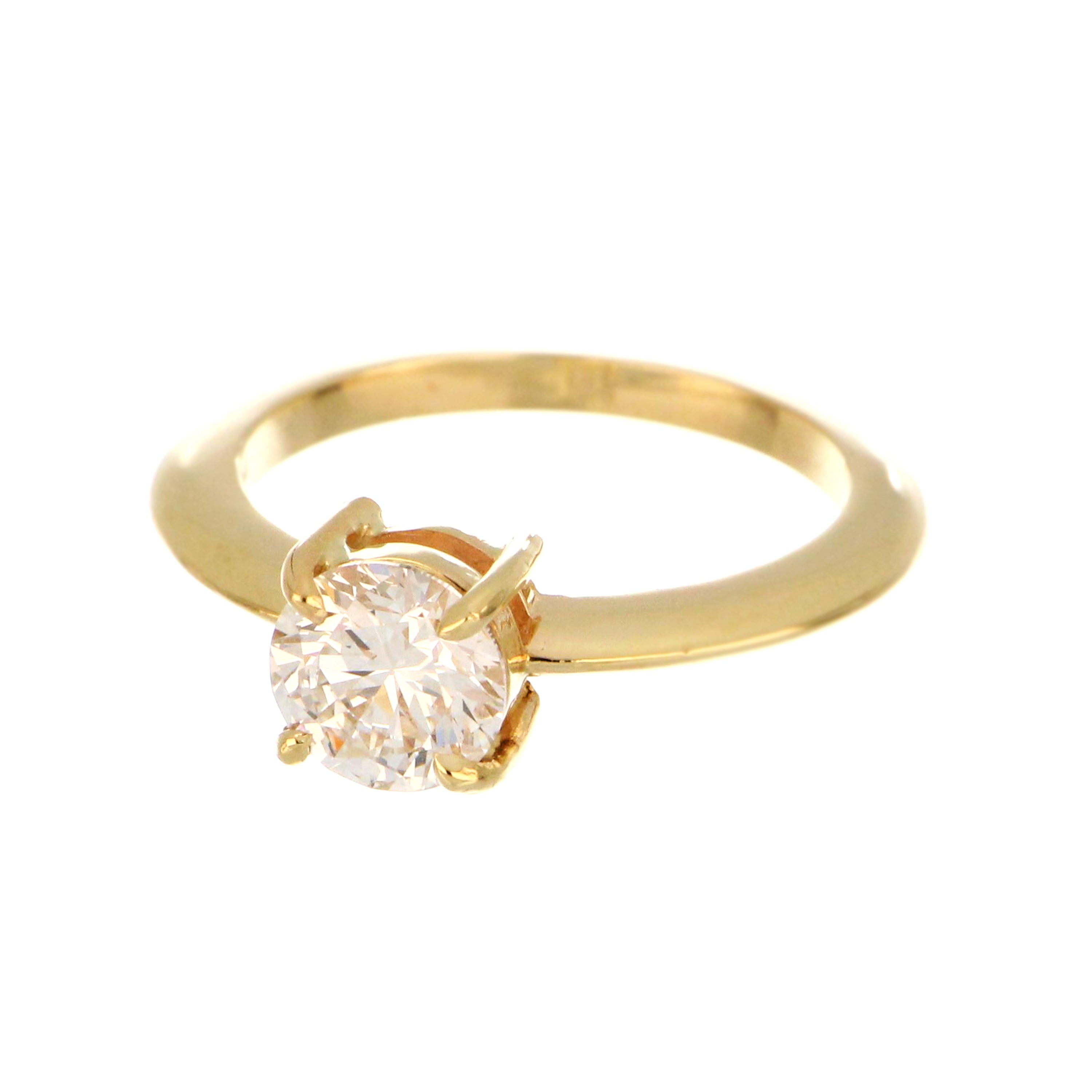 Top-down view of 14kt yellow gold solitaire diamond ring highlighting diamond size and clarity