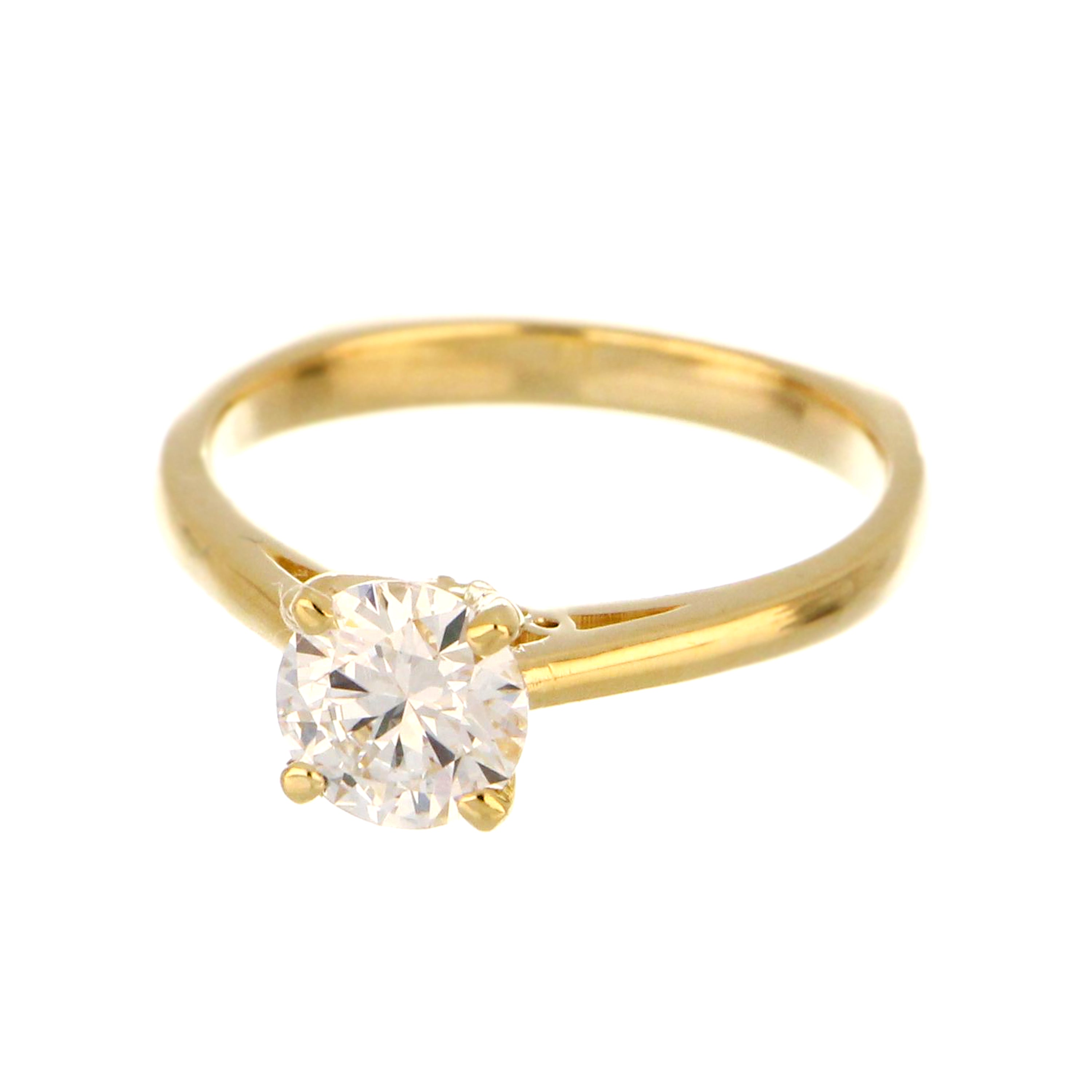 Top view of elegant yellow gold engagement ring with VVS1 clarity round lab grown diamond