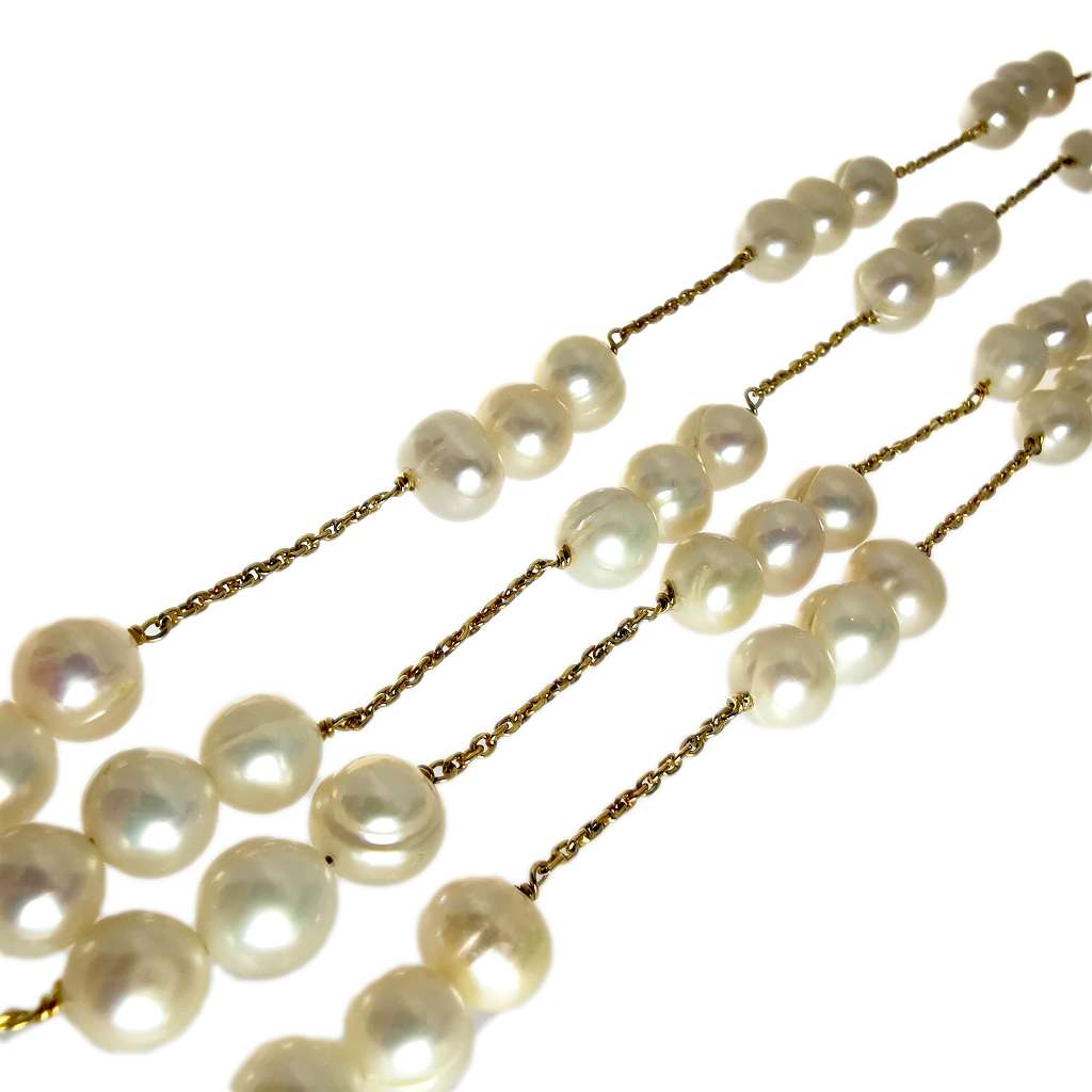 Opera-length freshwater pearl strand with gold accents