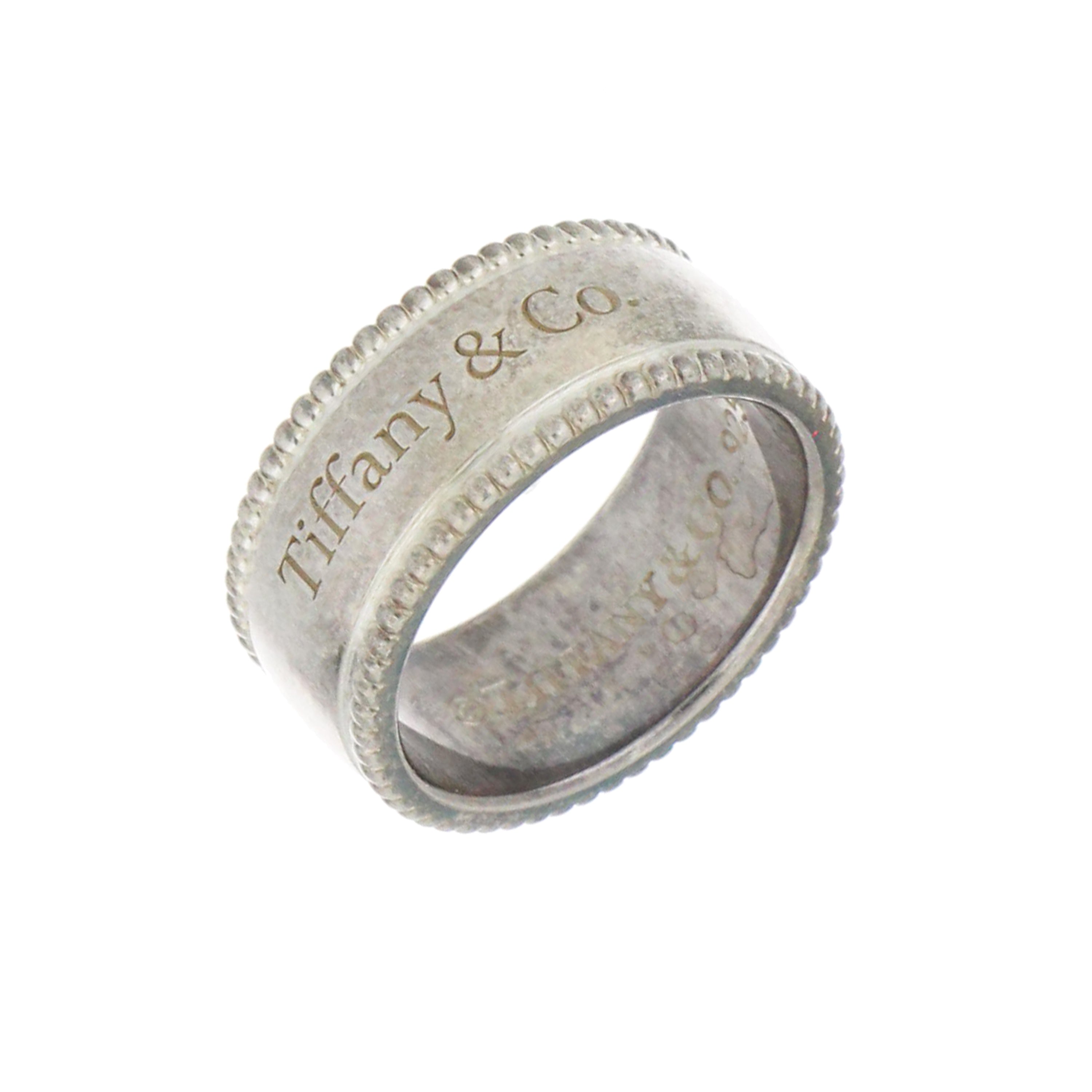 Side view of Tiffany & Co. 925 silver wide band ring