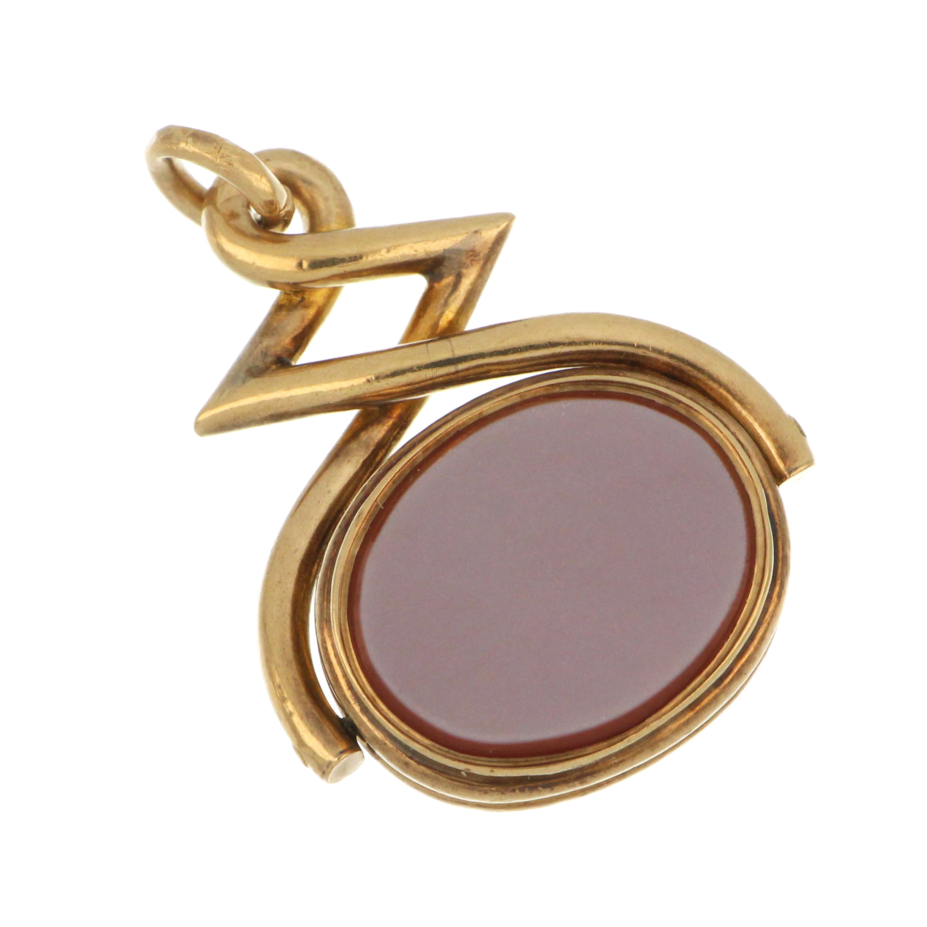 Side angle of 9kt gold fob showing sculpted frame