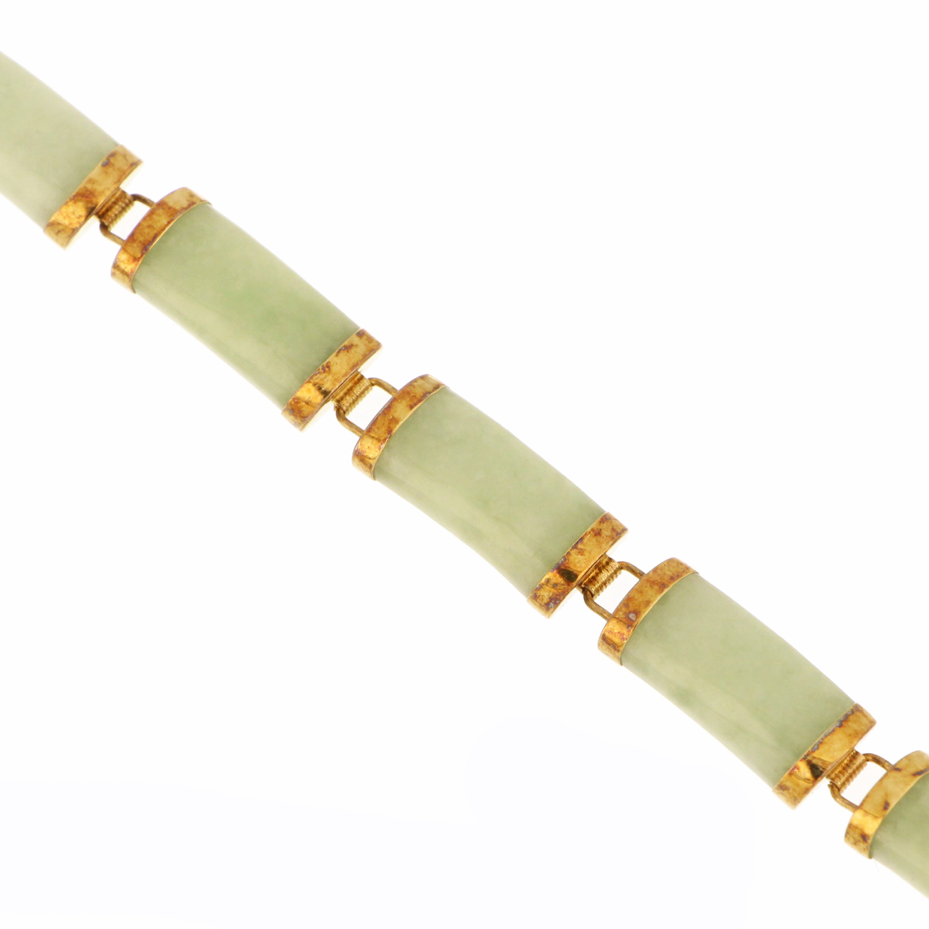 Estate jadeite jade bracelet with curved green stone segments