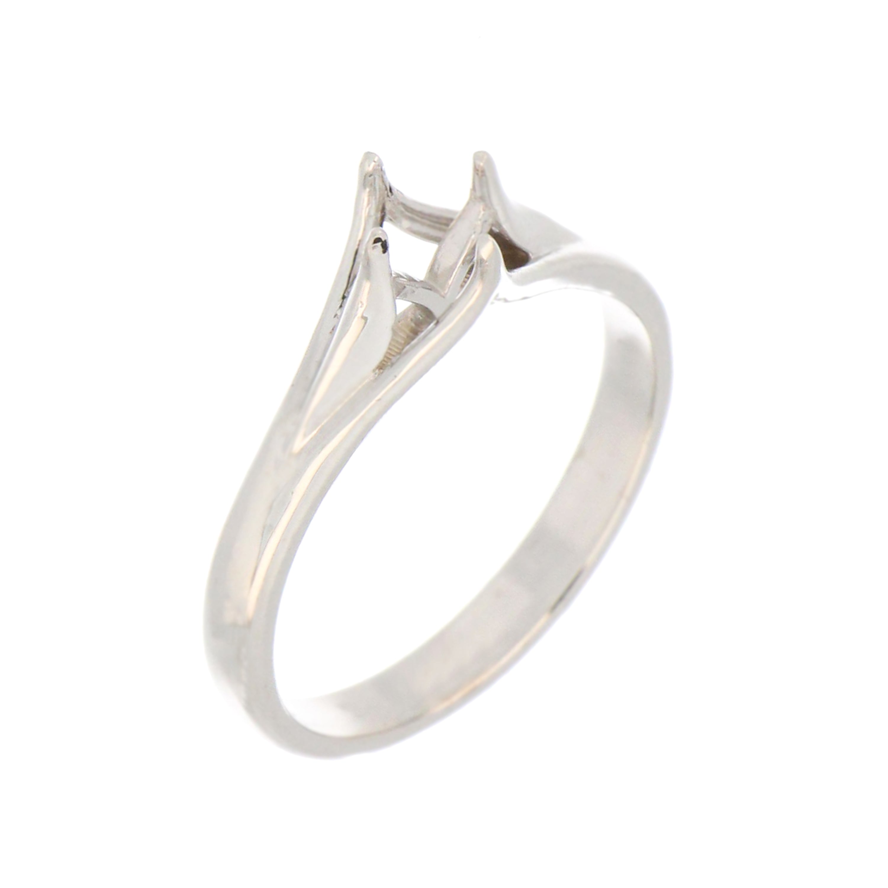 Side view of polished 14kt white gold engagement ring mounting