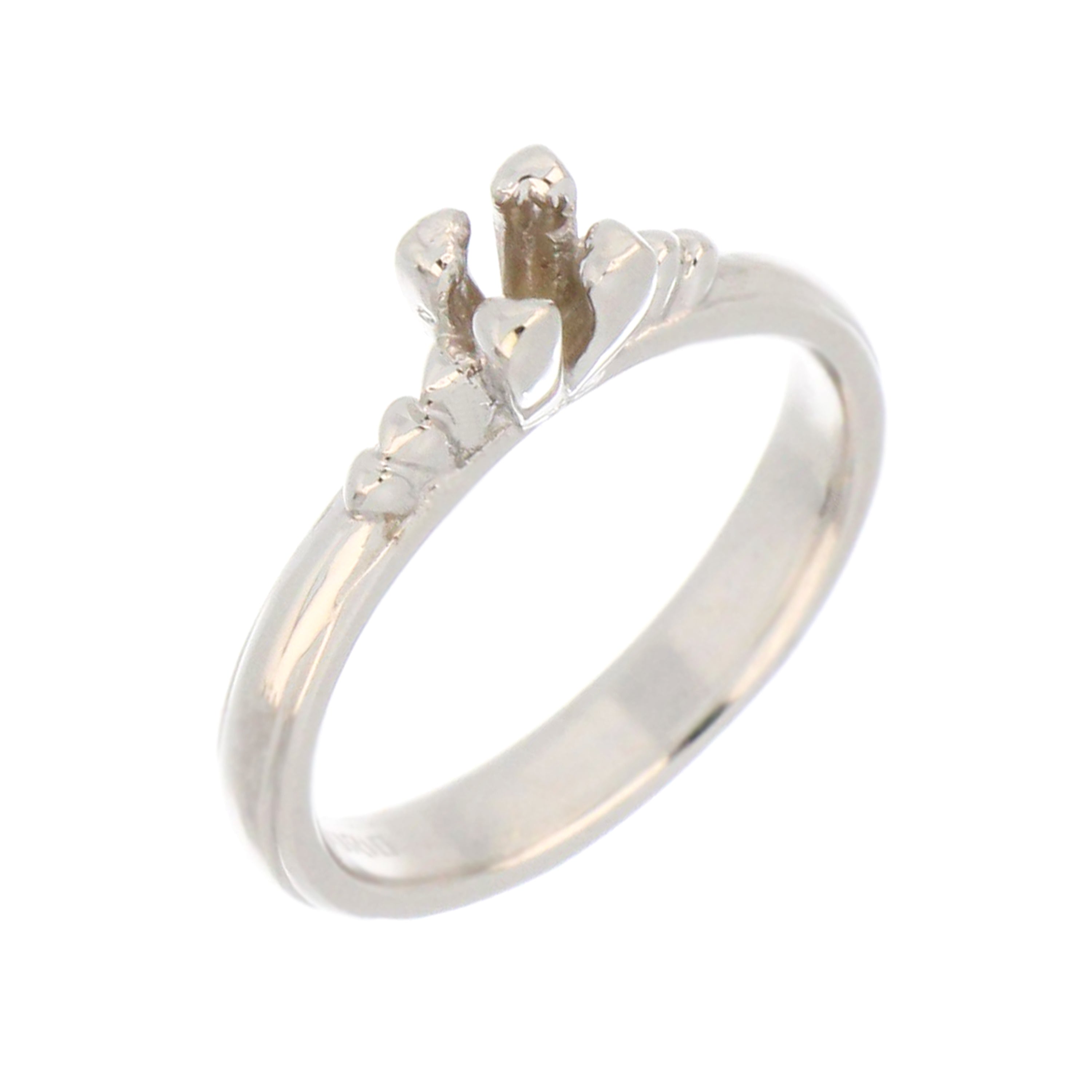 Side view of 14kt white gold engagement ring mounting for 5mm round stone