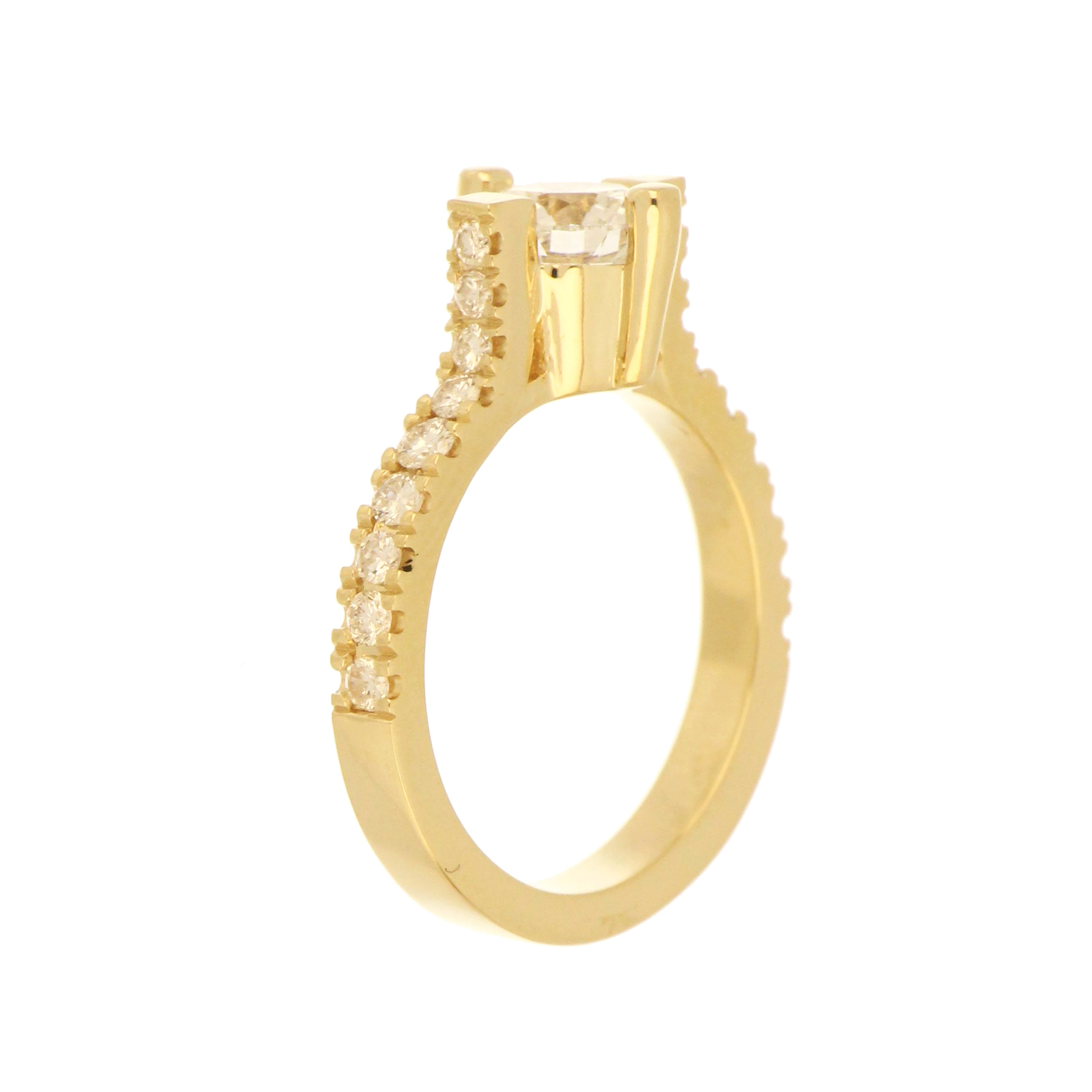 Lab-grown diamond ring in 14kt yellow gold with classic four-claw setting and polished band.