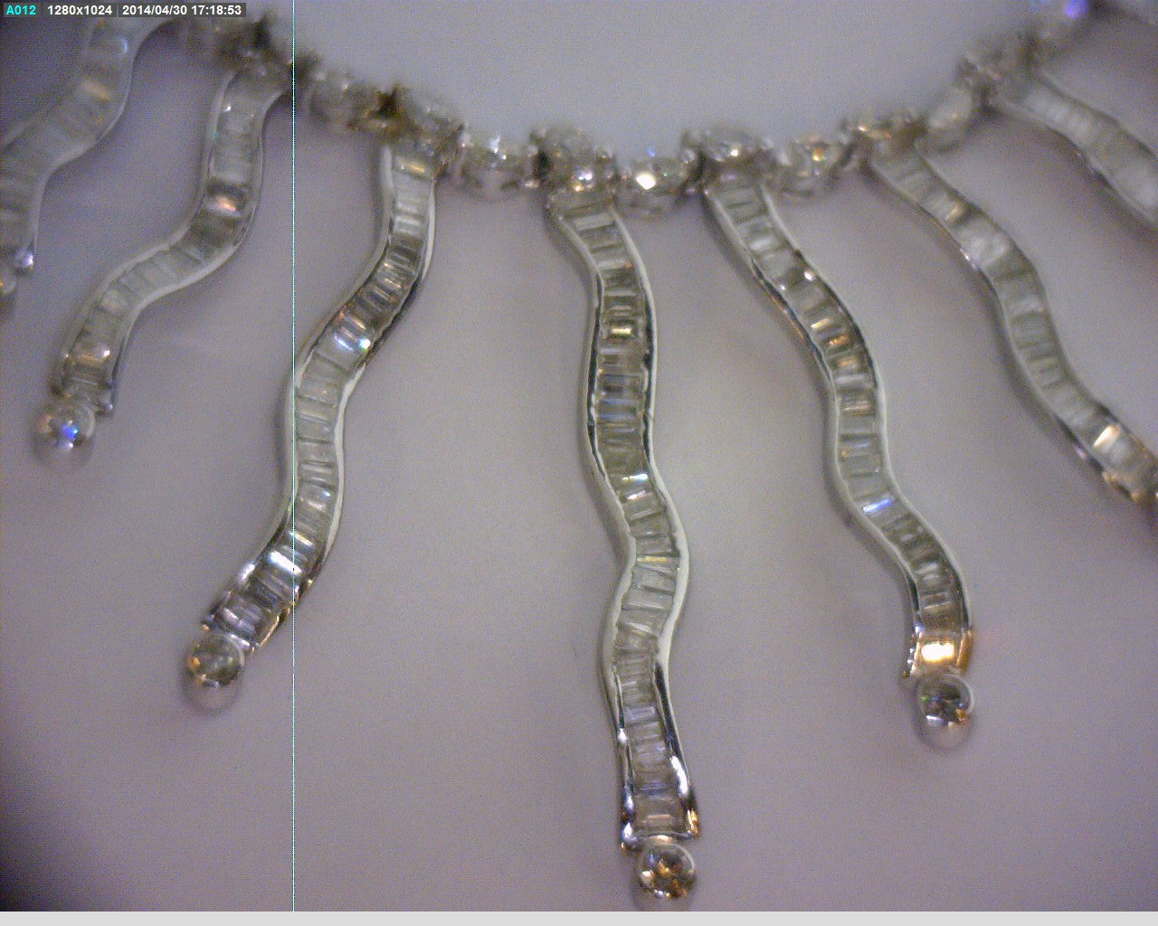Luxury diamond necklace in 18kt white gold photographed to emphasize rare craftsmanship and sparkle
