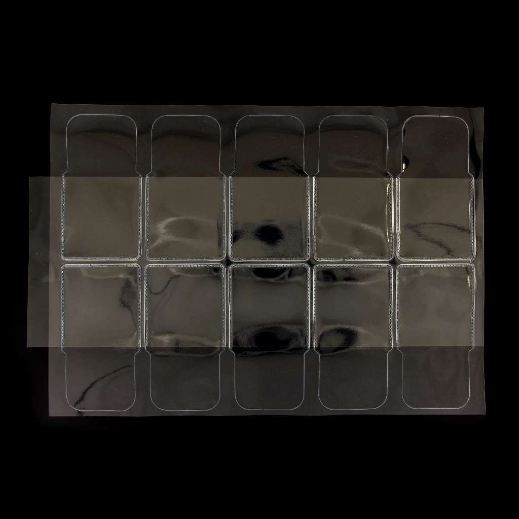 Close-up of UA 2x2 vinyl coin envelopes stacked in sheets, highlighting 10 envelopes per sheet for organized coin storage