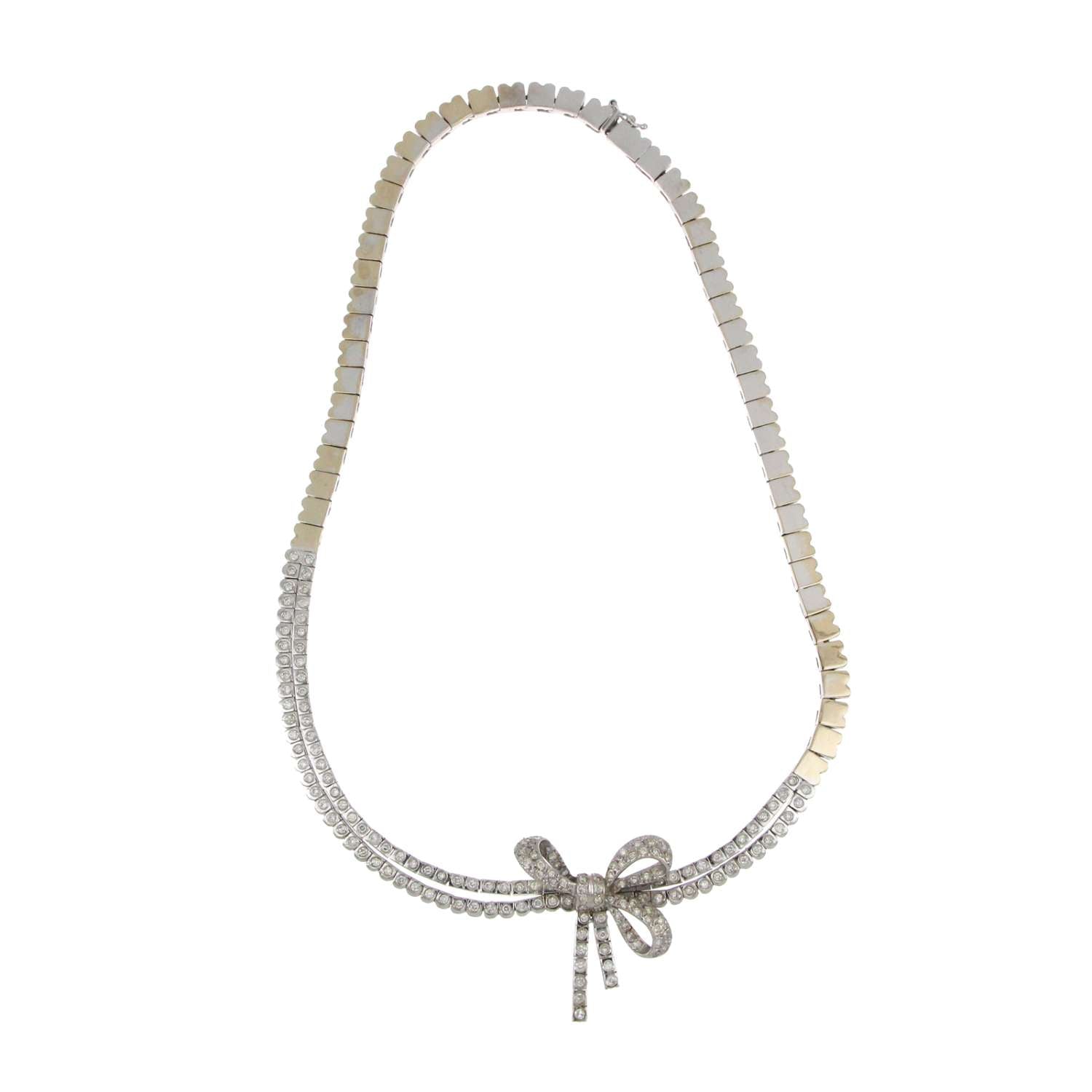 Detailed side view of 18kt white gold diamond and pearl necklace highlighting craftsmanship and diamond clarity