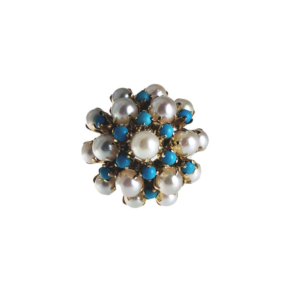 Side angle of 8kt yellow gold pearl and turquoise ring highlighting pearl size and turquoise half bead cuts