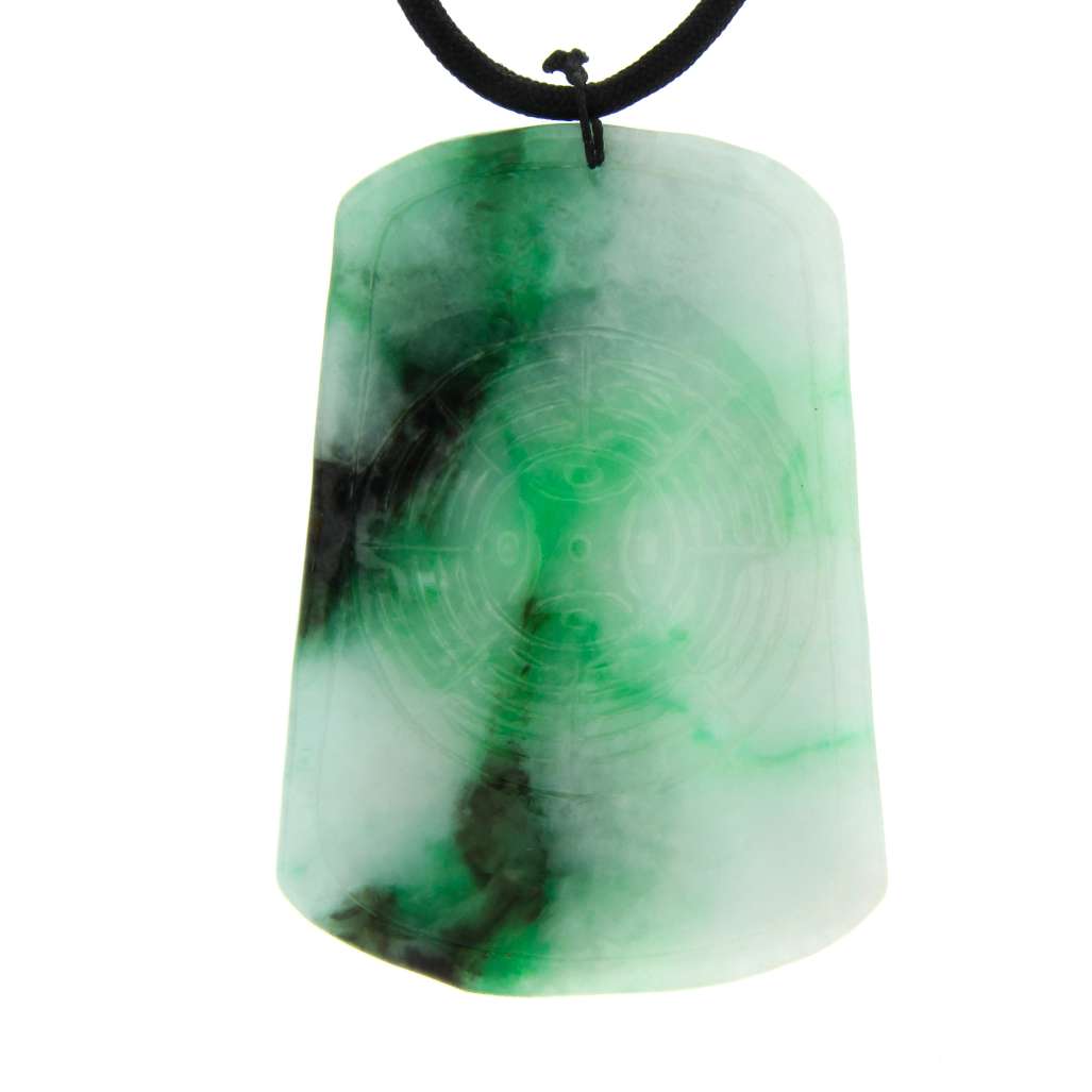 Front view of Burmese jadeite jade pendant combining white, medium green and black-green coloration with cultural motifs