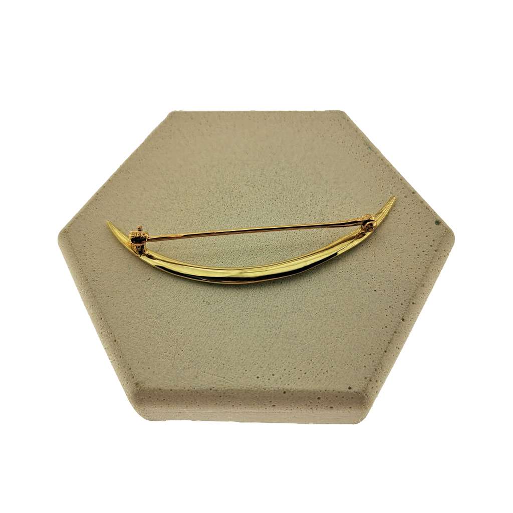 Side view of 14kt yellow gold moon brooch with white seed pearls, highlighting craftsmanship and overall lightweight design
