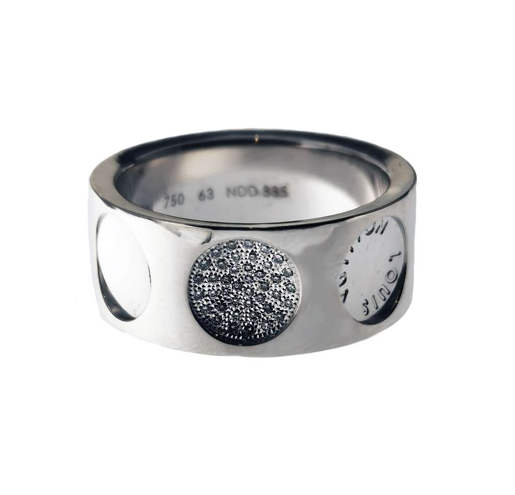 Angled profile of luxury 18kt white gold Louis Vuitton diamond band, showcasing elegant disc setting with full cut diamonds