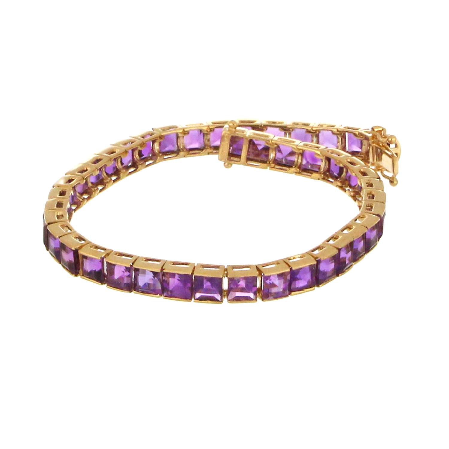 14kt yellow gold amethyst bracelet showing channel set square step cut purple amethyst stones