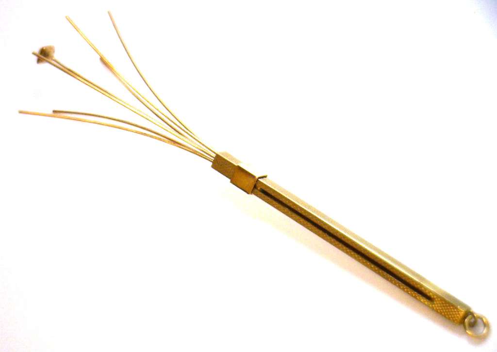 Back view of hand-made 9kt yellow gold stir tool style pendant with polished surface