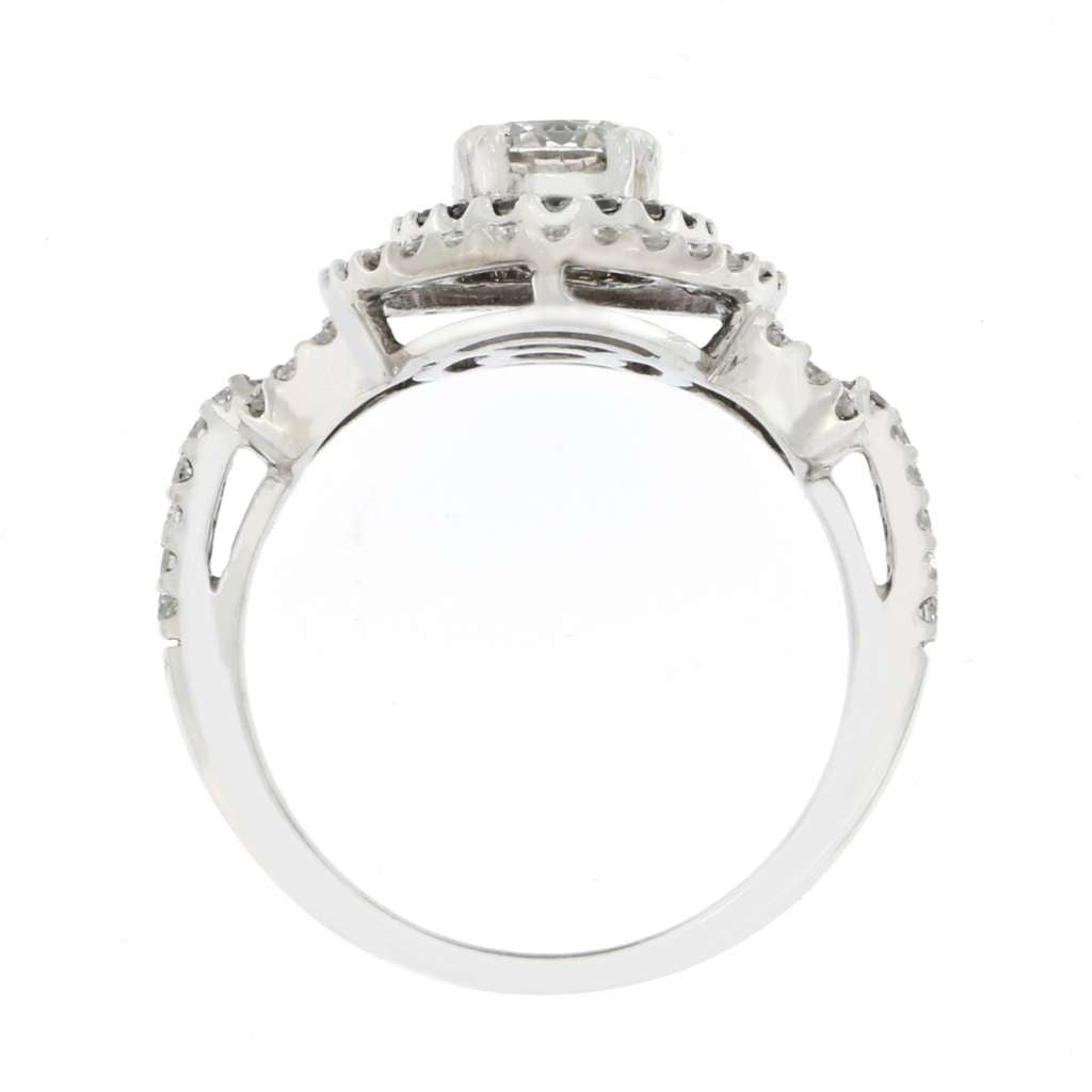 Detailed macro shot of 14kt white gold diamond ring highlighting diamond clarity and color contrast