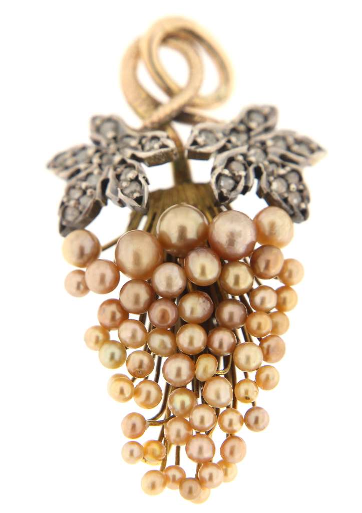 Close-up of pearl cluster and old rose cut diamonds on 12kt tricolor gold pendant in grape motif