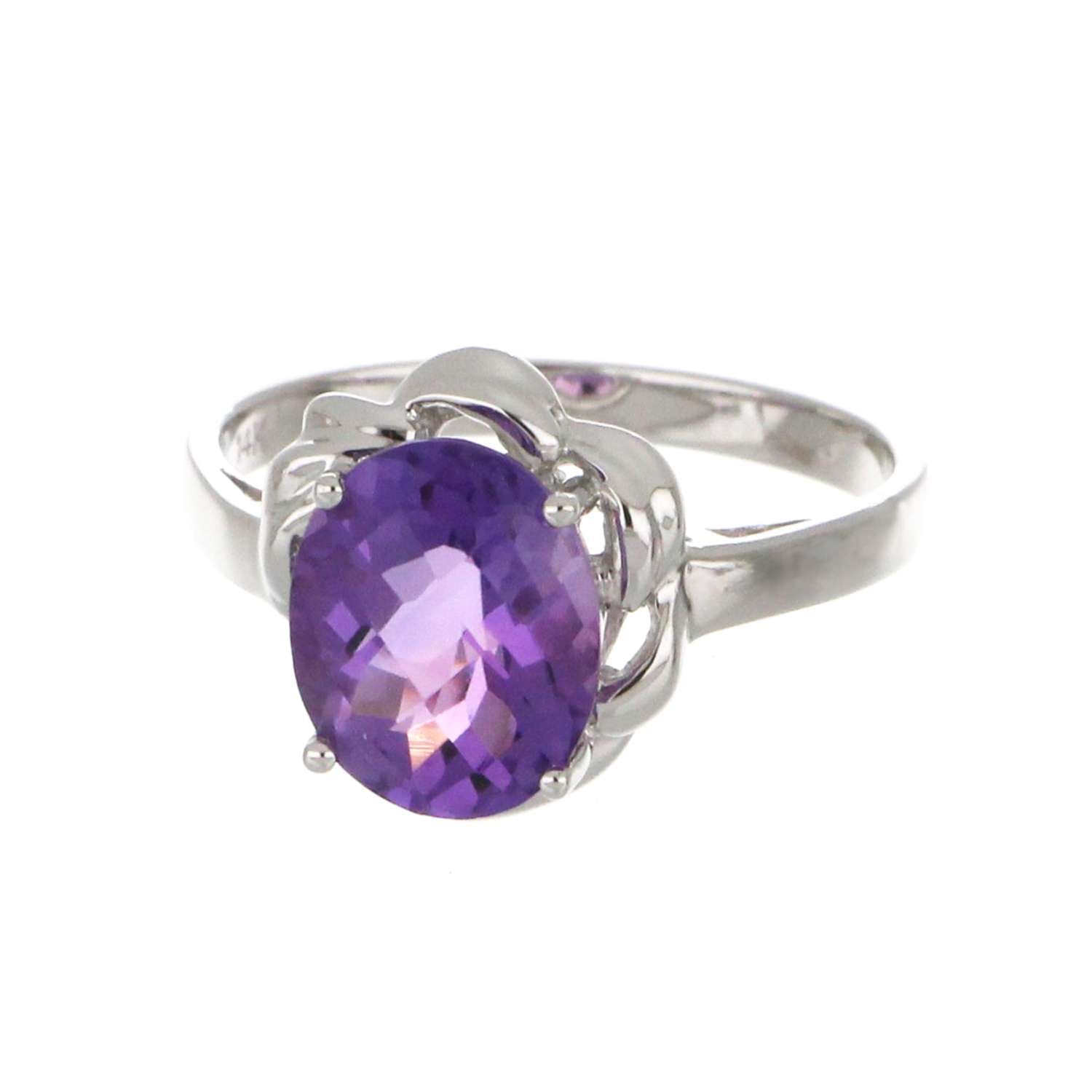 14kt white gold ring featuring a close-up of an oval chess cut purple amethyst set in claw setting