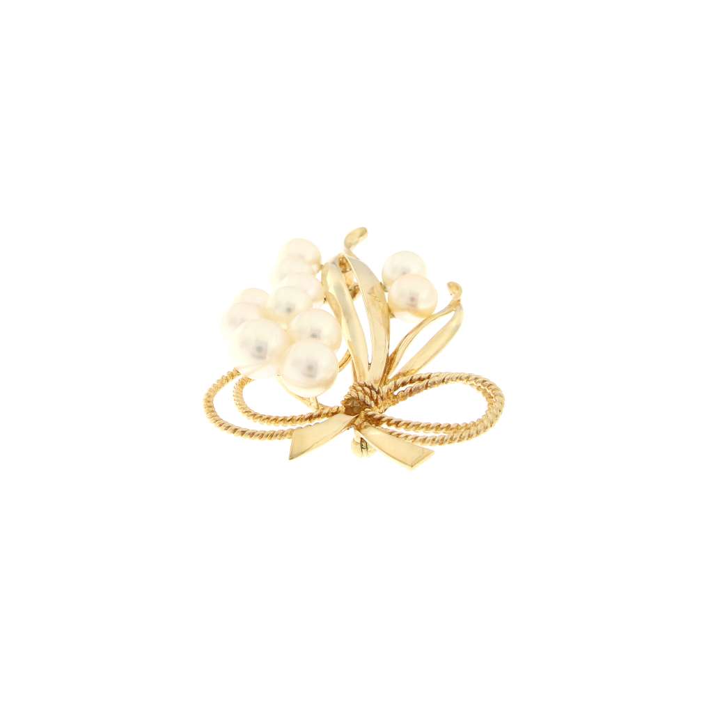 Back view of 14kt yellow gold pearl brooch with secure clasp and hallmark stamp