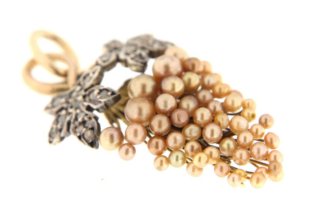 Side angle of 12kt yellow, white and rose gold pearl grape pendant showing detailed craftsmanship