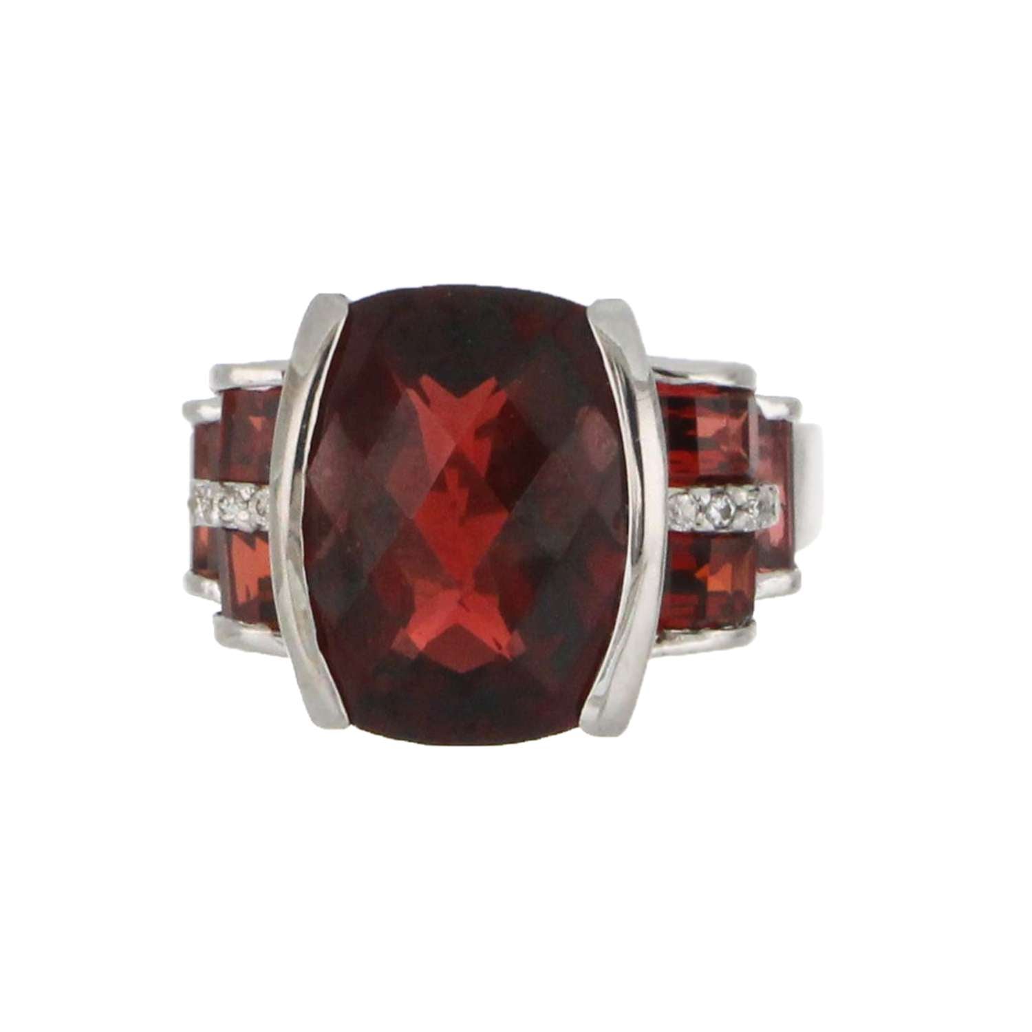 Top view of 14kt white gold garnet ring sized 6.75 with sparkling garnets and diamonds