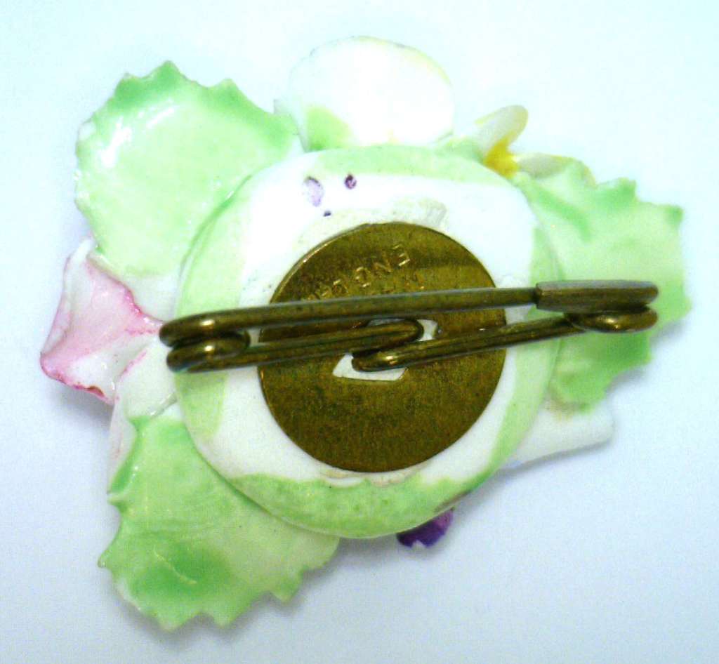 Porcelain floral bouquet brooch showing side angle, highlighting lightweight 7.36g design and fine craftsmanship