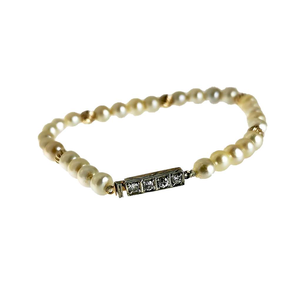 Elegant pearl bracelet showing gold clasp with sparkling full-cut diamonds, highlighting 6.5 inch length and balanced design