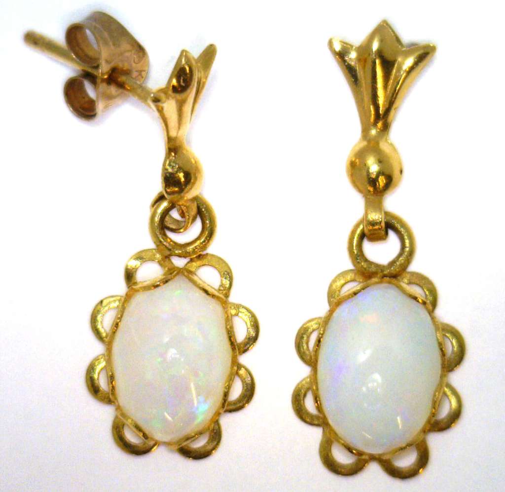Ladies' 10kt yellow gold dangling style opal earrings