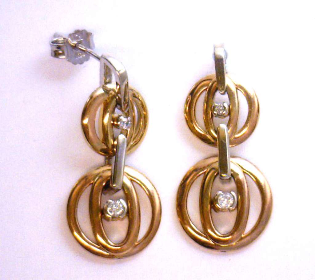 10kt rose gold and white gold diamond earrings showing two-tone metal and 4 full cut diamonds with moderate sparkle