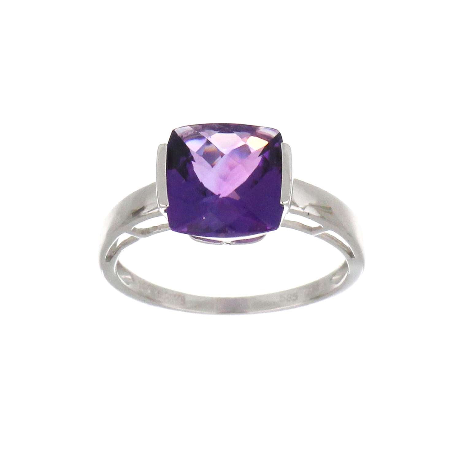 Perspective showing detailed channel setting of 14kt white gold amethyst ring with cushion-shaped purple stone