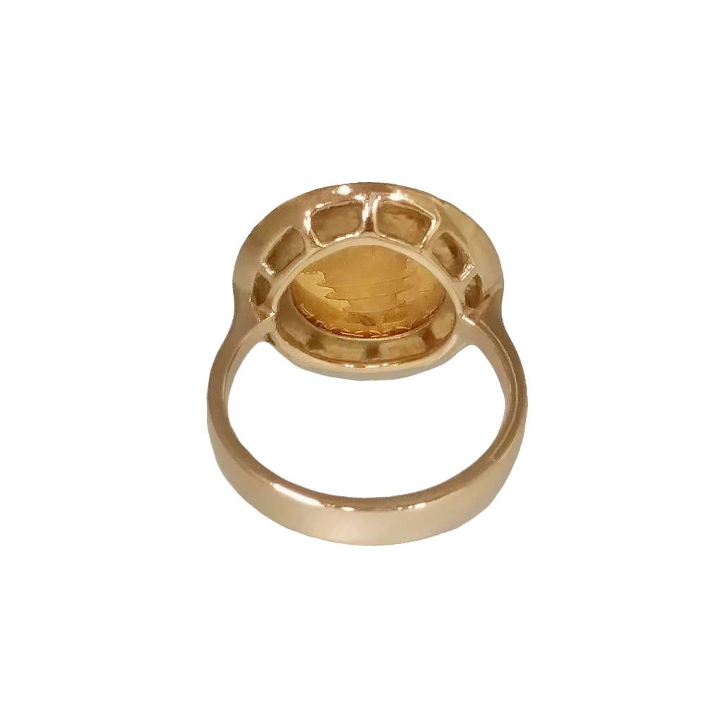 Close-up front view of framed gold China Panda coin ring in 14kt yellow gold, highlighting coin face and intricate bezel setting