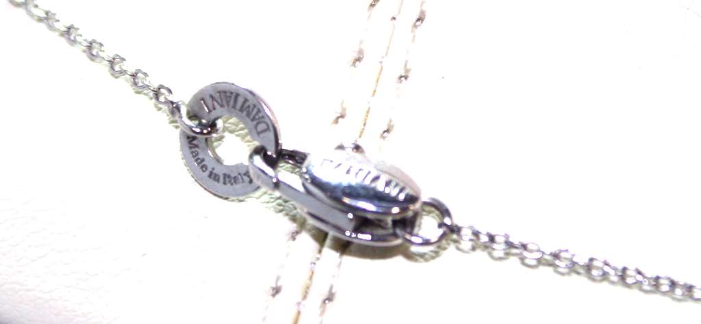 Detailed front view of Damiani 18kt tri-color gold pendant with sparkling 0.51 cttw diamonds in SI1 to SI3 clarity