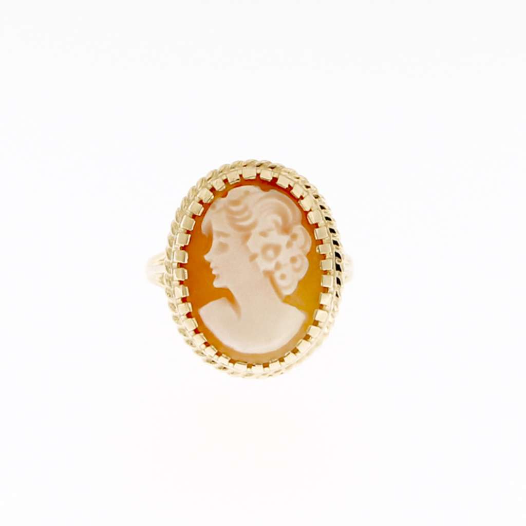 Close-up of 10K yellow gold ring with oval-shaped natural shell cameo, elegant vintage design