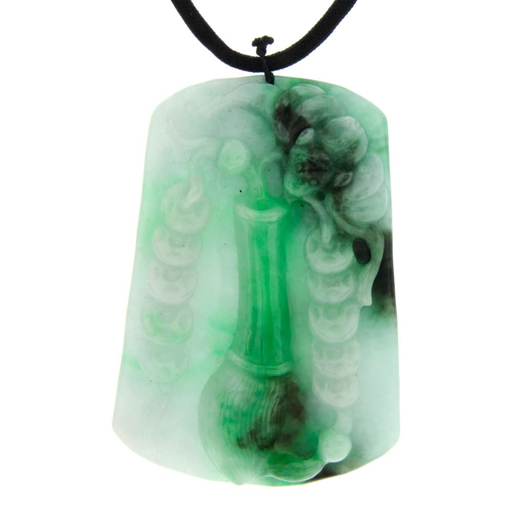 Opaque Burmese jadeite jade pendant carved on one side with Chinese money symbol in white and green hues