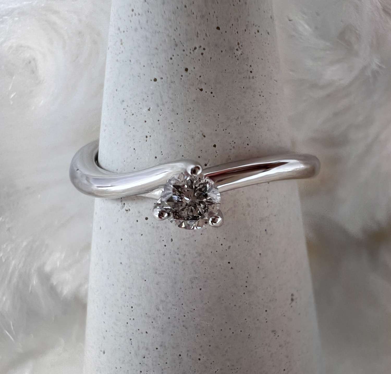 10kt white gold diamond ring showing round brilliant diamond on front view, elegant 3-claw setting