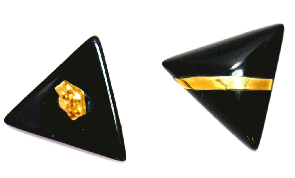A pair of 14kt black onyx stud style earrings