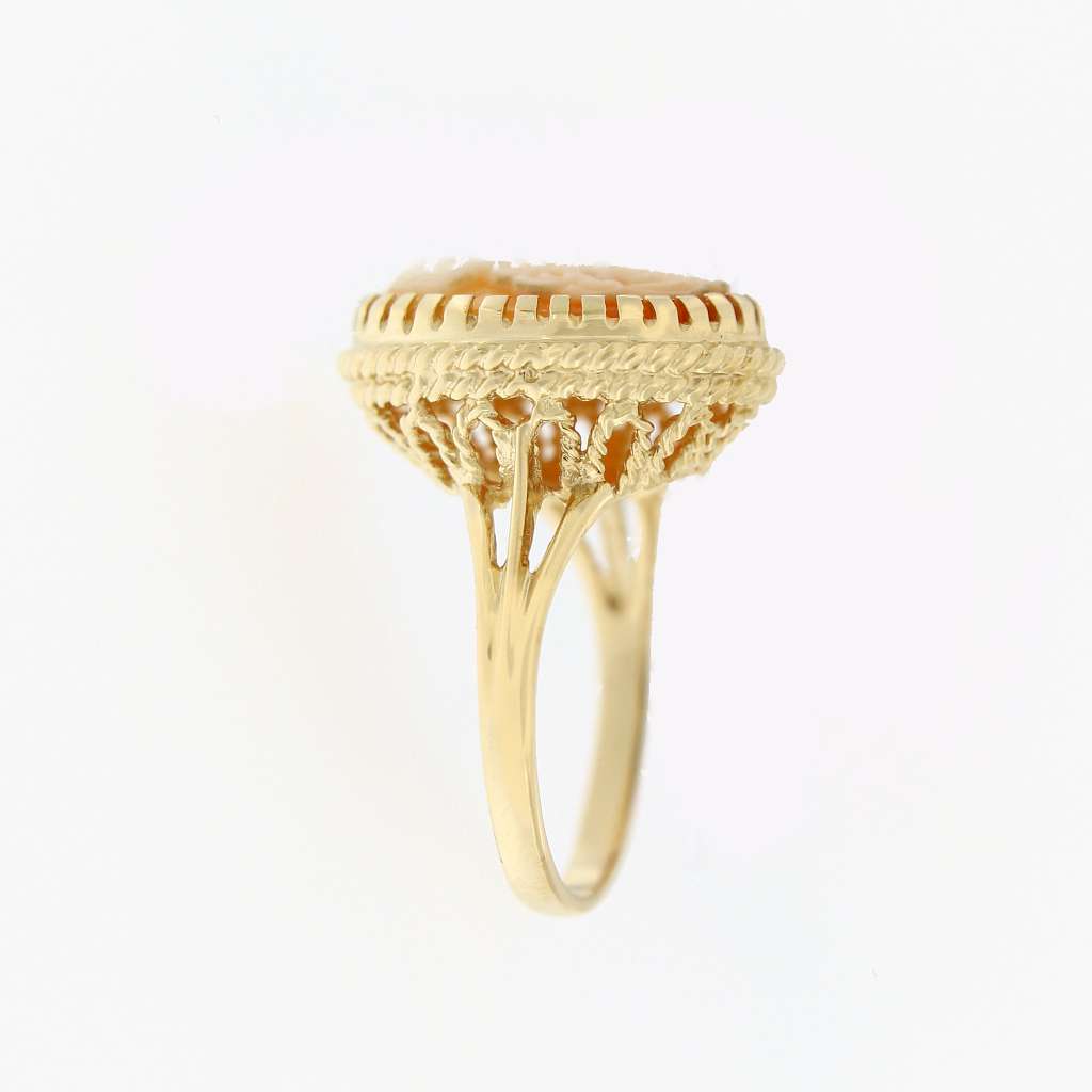 Top-down view of vintage 10K gold oval shell cameo ring, size 6.75, highlighting fine detailing