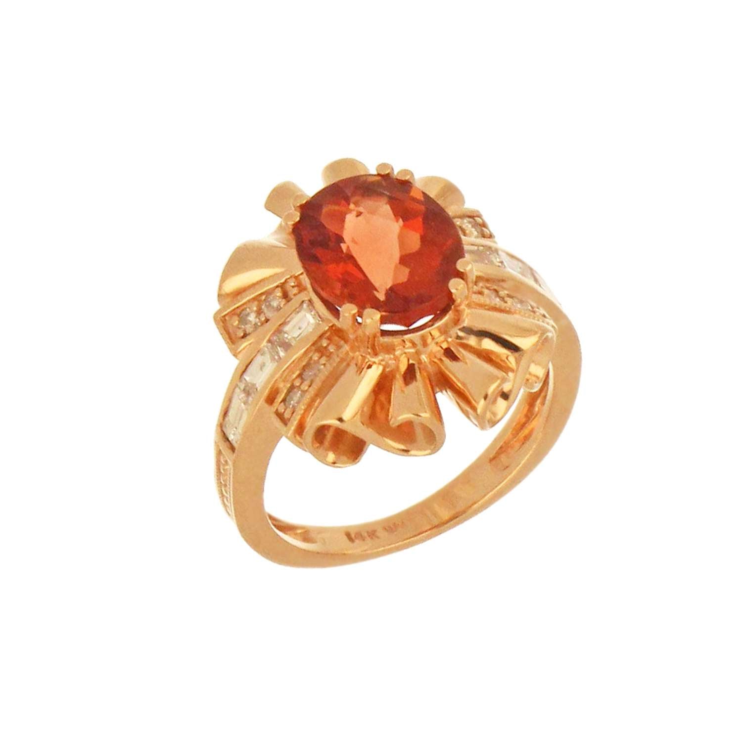Side profile of 14kt rose gold andesine feldspar ring highlighting diamond baguette cuts and delicate band