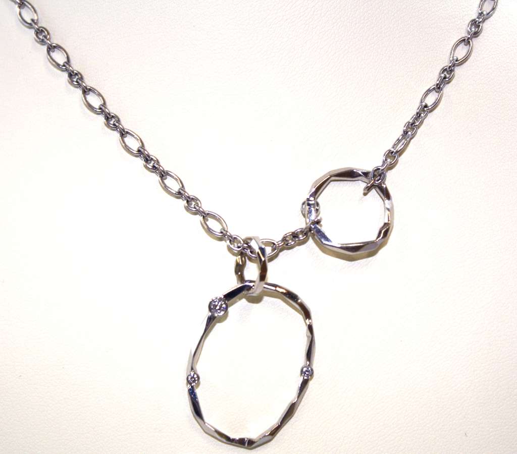18kt white gold diamond necklace front angle with round brilliant cut diamonds sparkling