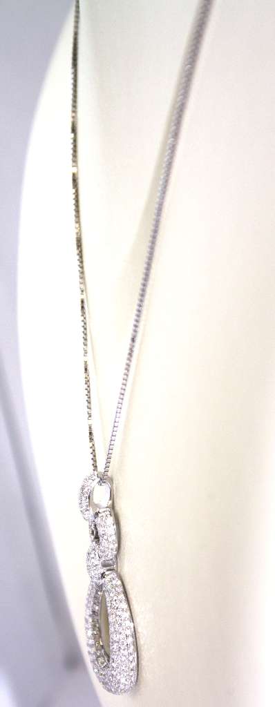 Side angle of elegant 18kt white gold diamond pendant weighing 7.61 grams, crafted for luxury appeal