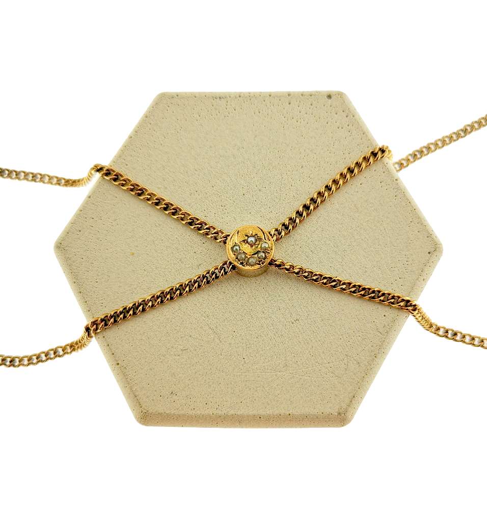 10kt yellow gold pocket watch curb link chain, displaying full length and sliding charm with six seed pearls, elegant vintage collectible