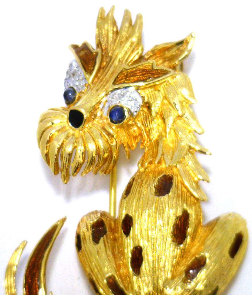 Side profile of 18kt yellow gold stylized dog brooch emphasizing enamel tail and diamond placements
