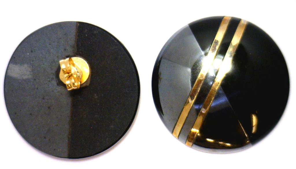 A pair of 14kt black onyx stud style earrings