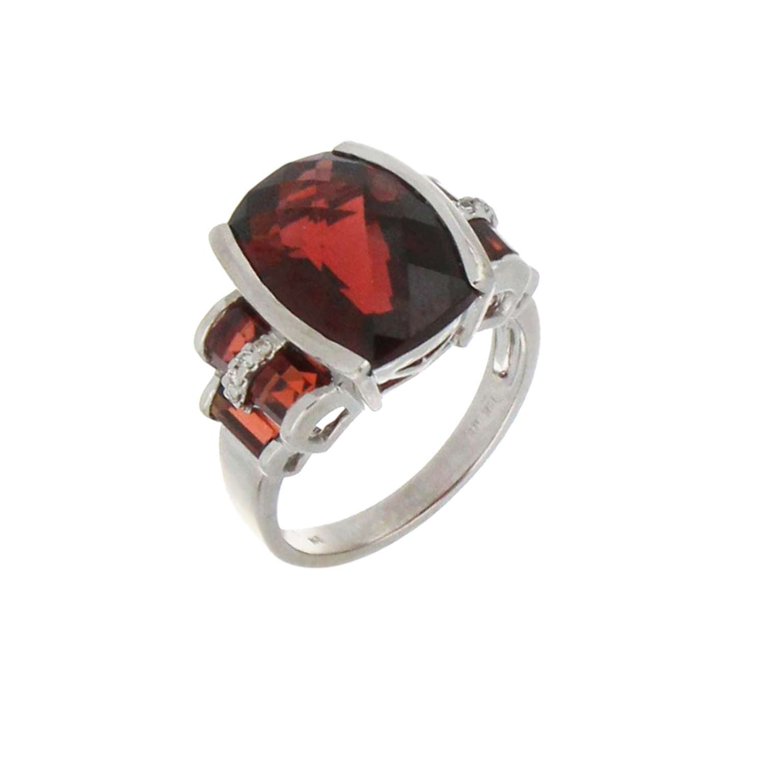 Close-up of channel setting with six baguette garnets and ten round full cut diamonds in white gold ring