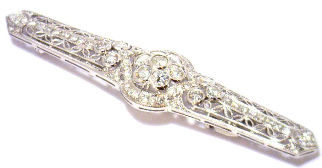 Close-up detail of 14kt white gold brooch diamonds highlighting cut and clarity in natural light