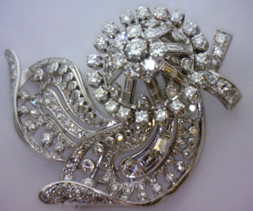 Vintage brooch shown alongside conversion parts to transform into elegant stud earrings